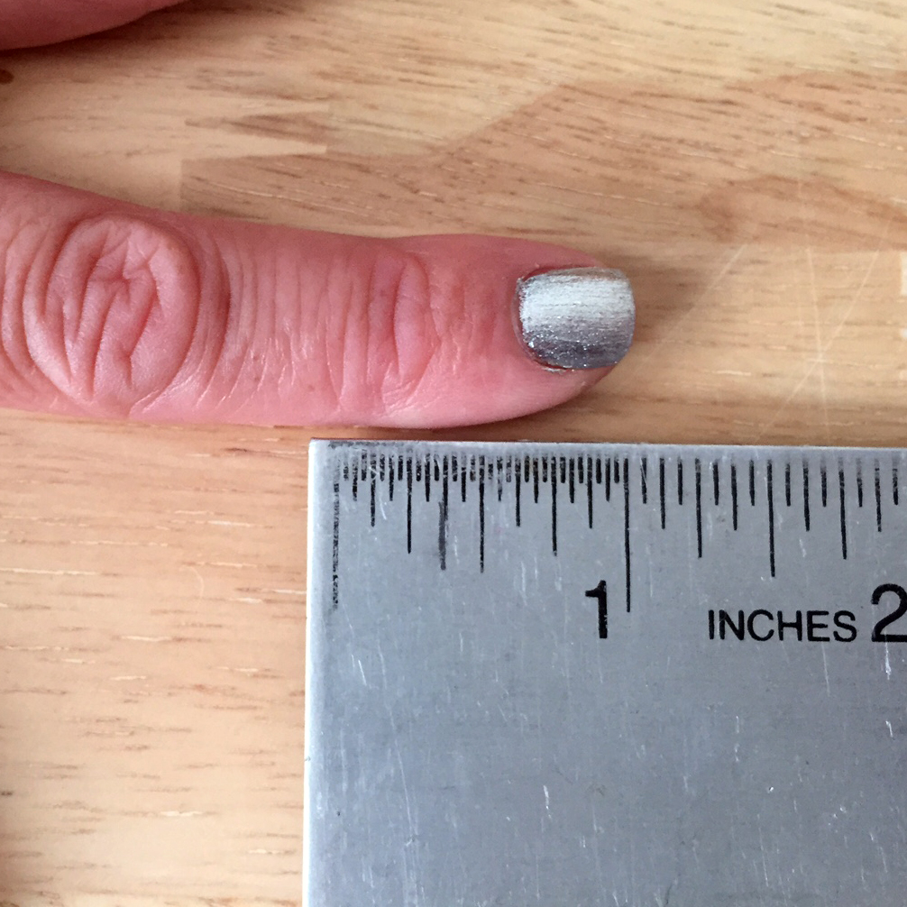 1" measurement from knuckle to finger tip