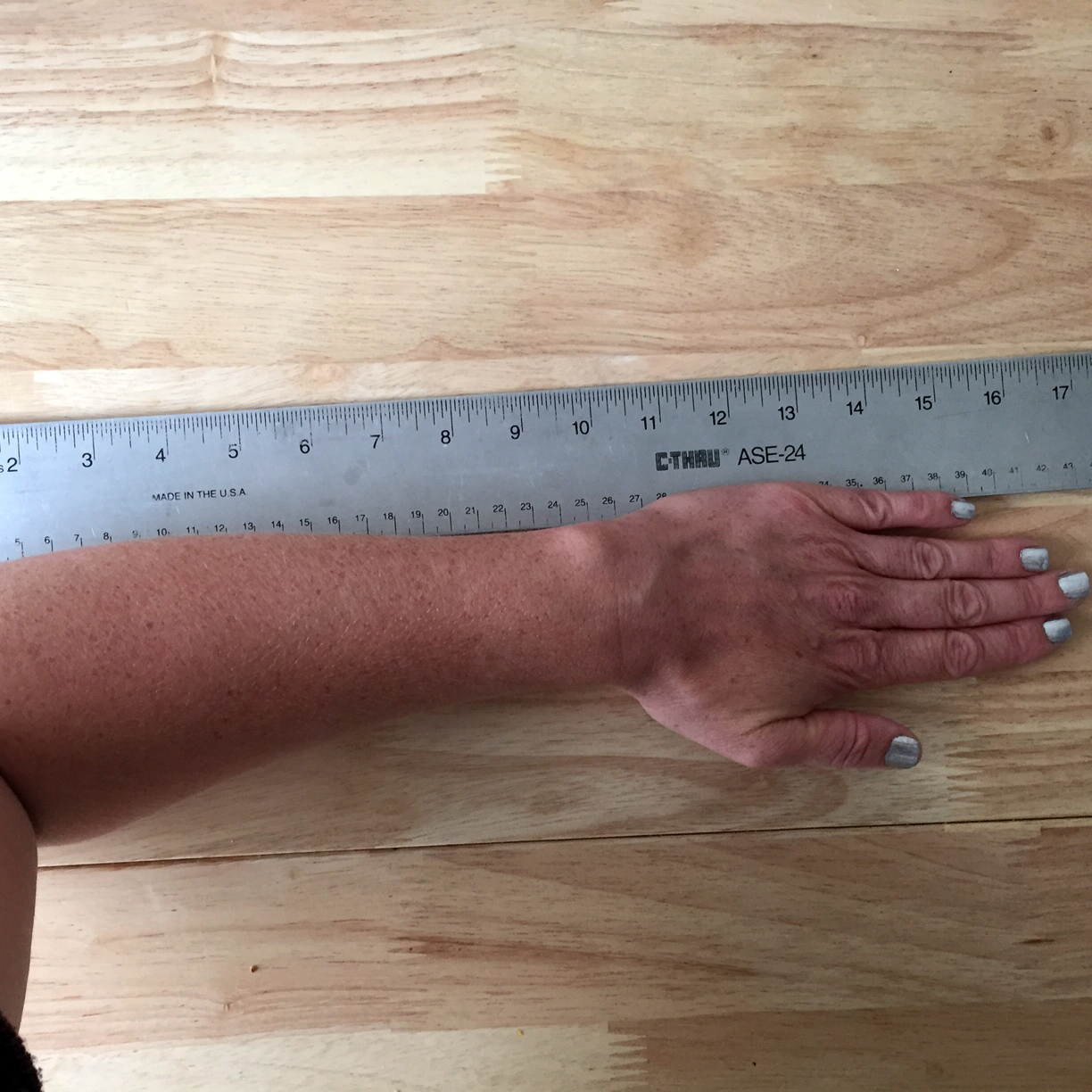 17" measurement from elbow to tip of middle finger